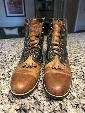 Justin Boots Two-Tone Brown and Black Lace-Up Fringe Boots